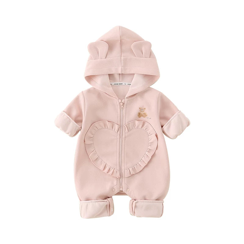 Pink baby romper with heart pocket on white background