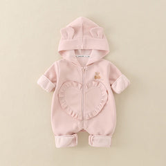 Blush pink hooded baby romper with heart pocket, front view